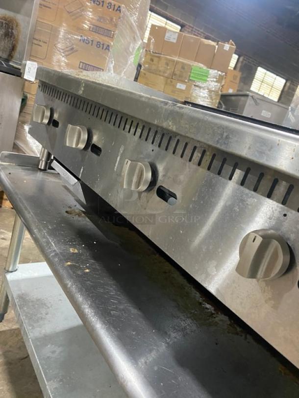 L&J Commercial Stainless Steel Gas Griddle, Model JRMG48NG, with undershelf, back, and side splash. Includes gas hose.