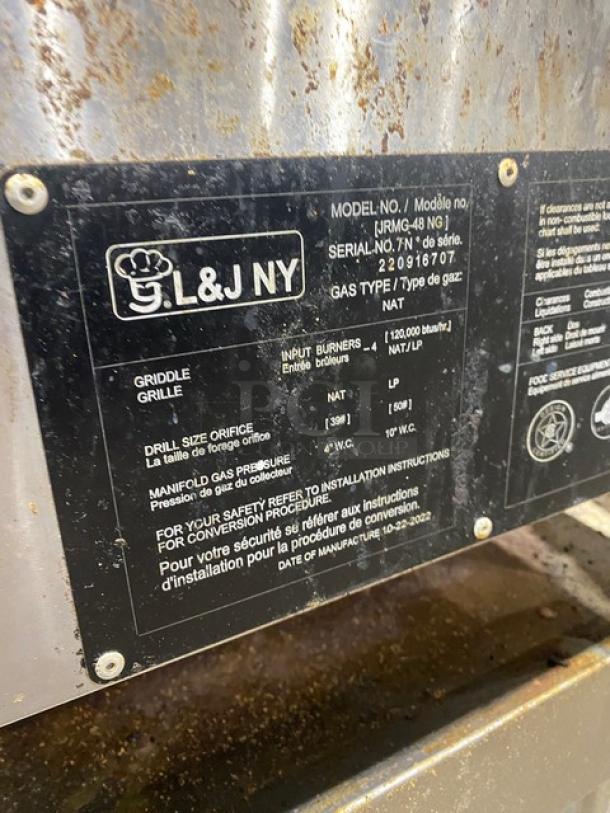 L&J JRMG48NG stainless steel griddle with undershelf, legs, back & side splash, model JRMG-48 NG, SN: 220916707 tag visible.