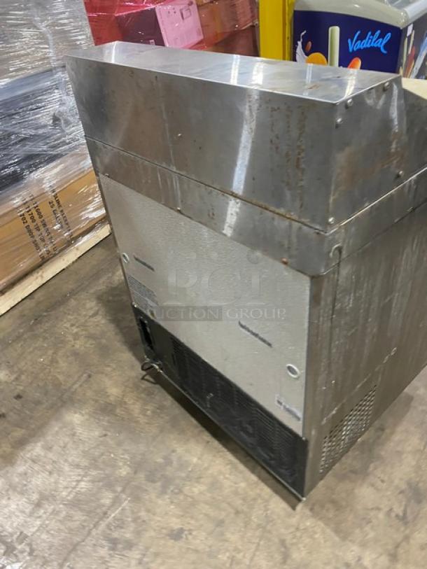 Avantco stainless steel refrigerated prep table on casters, features cutting board and poly coated wire rack. 115V, used condition.