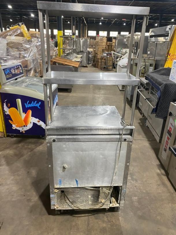 True TWT-27 commercial stainless steel single door worktop refrigerator with backsplash, double overhead shelves, and casters.