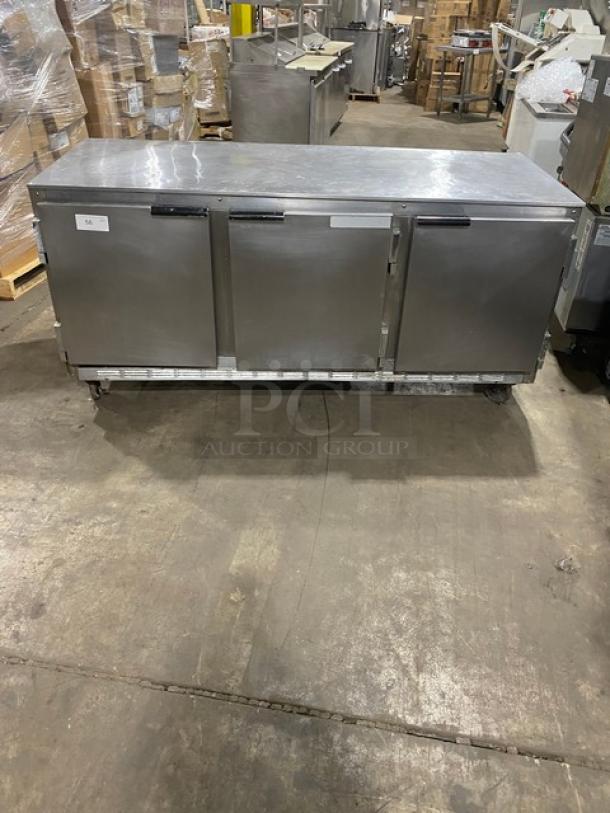 Beverage-Air stainless steel 3-door undercounter refrigerator, model UCR72A, with poly-coated wire racks, on casters.