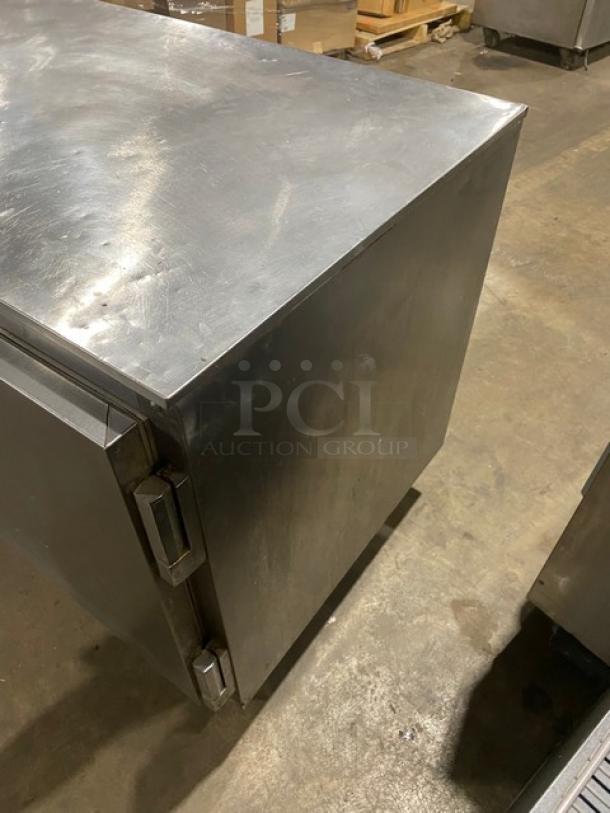 Beverage-Air stainless steel 3-door undercounter refrigerator, model UCR72A, on casters, with poly coated wire racks.