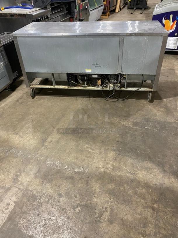 Beverage-Air UCR72A 3-door stainless steel undercounter refrigerator, poly coated wire racks, on casters, 115V, used condition.