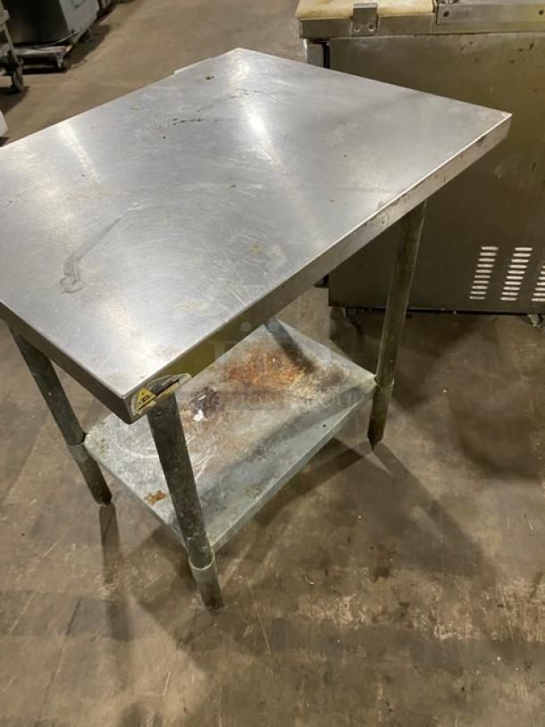 Aero stainless steel worktop table, single undershelf, on legs. Shows signs of wear and rust on the undershelf.