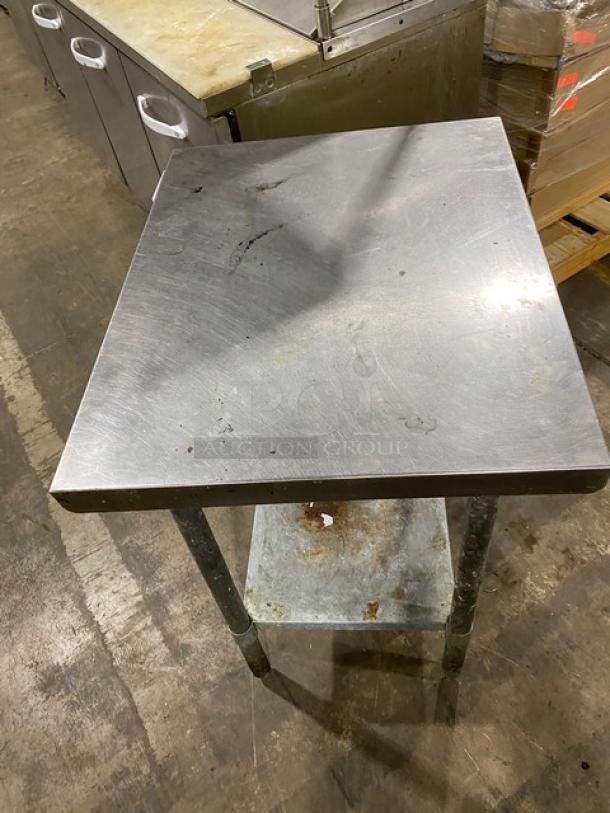 Aero commercial stainless steel worktop table with single undershelf, on legs. Features visible wear and surface markings.