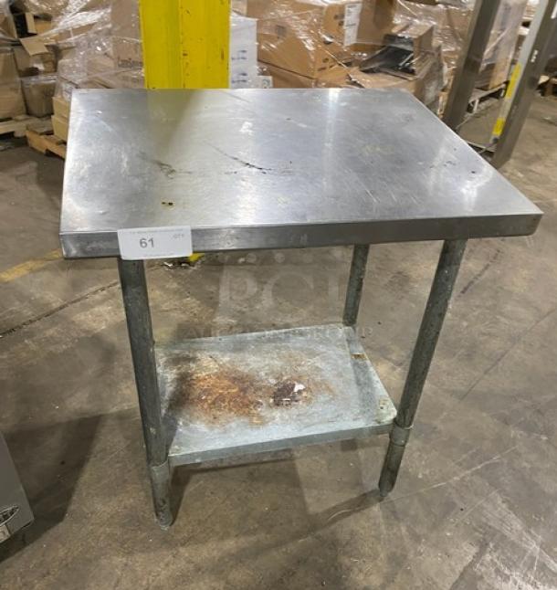 Aero stainless steel worktop table with single undershelf. Used condition with visible wear. On sturdy legs.