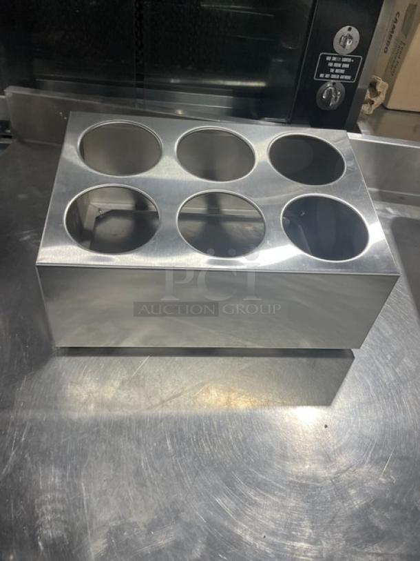 Winco stainless steel 2-tier flatware holder, model FC6H. Features 6 cylinder holes. New condition.