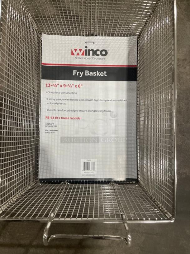 Brand new Winco FB-35 commercial 6" deep mesh fry basket with gray grip handle, one-piece construction, detailed label.