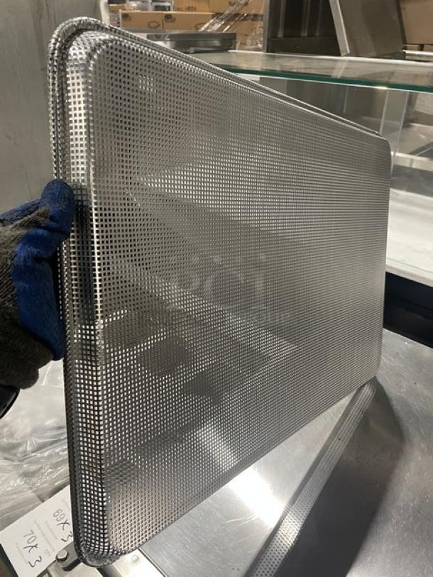 NEW Focus Foodservice Commercial Aluminum Mesh Perforated Bun/Sheet Pan, Model 904692, full-size, pristine condition.