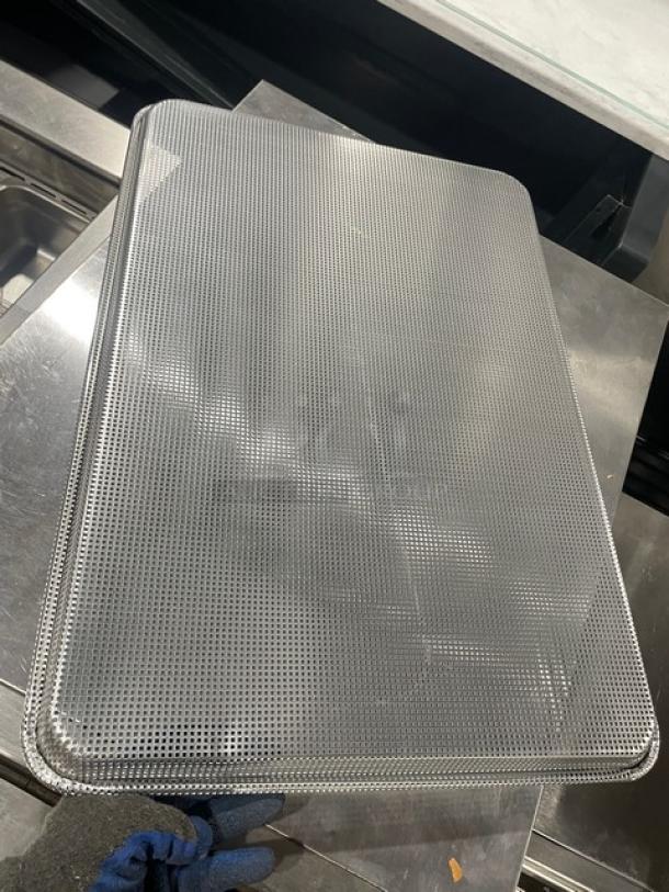 Focus Foodservice commercial aluminum perforated bun/sheet pan, model 904692, new condition, full-size mesh.