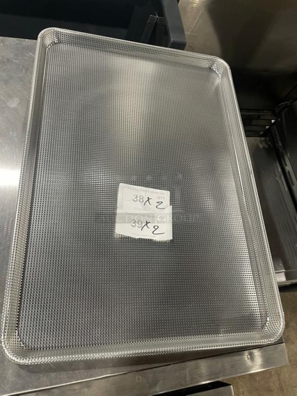 Brand new Focus Foodservice aluminum mesh bun/sheet pan, model 904692. Perforated full-size, commercial-grade.
