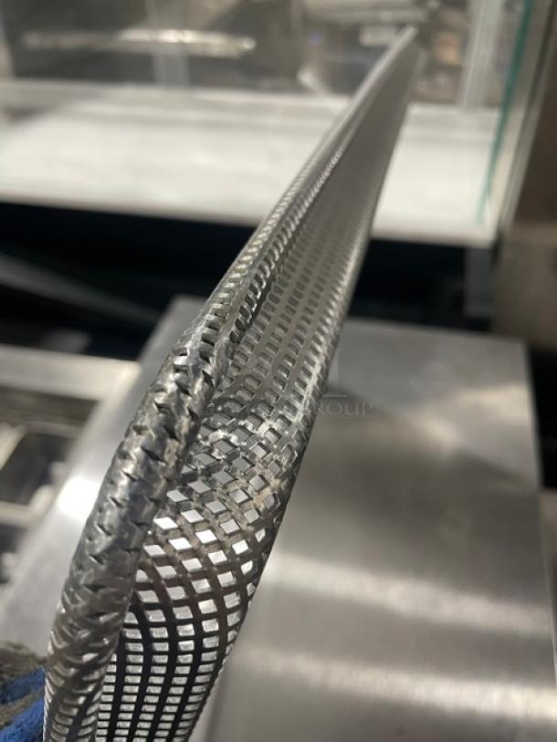 Brand new Focus Foodservice 904692 aluminum mesh perforated sheet pan, commercial-grade, full-size, ideal for baking.