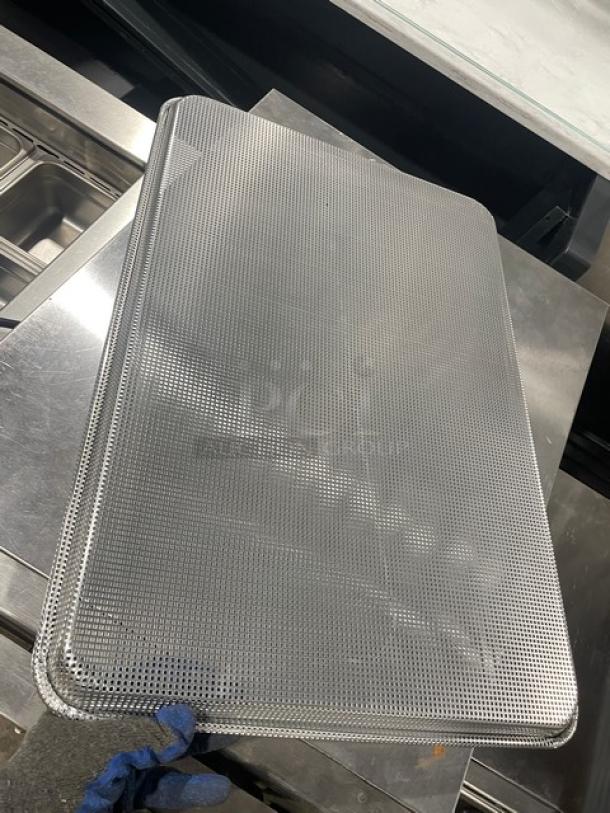 Brand new Focus Foodservice aluminum perforated bun/sheet pan, model 904692, full-size, commercial-grade.