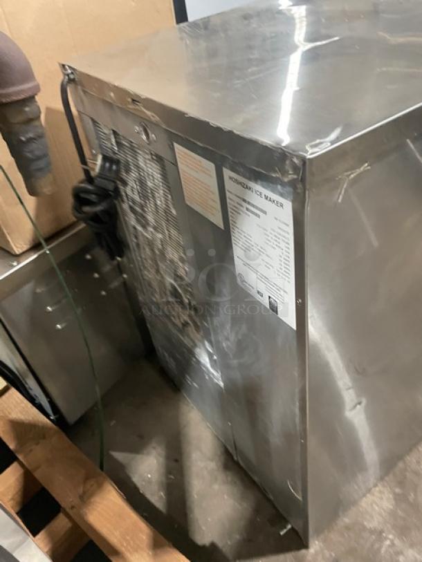 Hoshizaki KM-515MAH ice machine, stainless steel, air-cooled, electric, 115-120V, 1 phase, model tag visible, good condition.