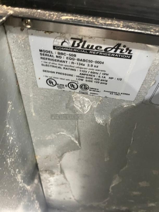 Blue Air commercial bottle cooler with black powder coating, model BBC-50B. Features double stainless steel sliding top lids. Serial No: EQQ-BABC50-0004. 115V, 1 phase.