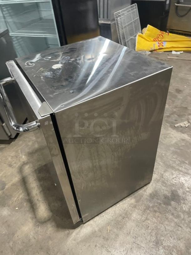 Ice Jungle C150SD 24" stainless steel outdoor refrigerator, single door, poly-coated wire rack, 115V, used condition.