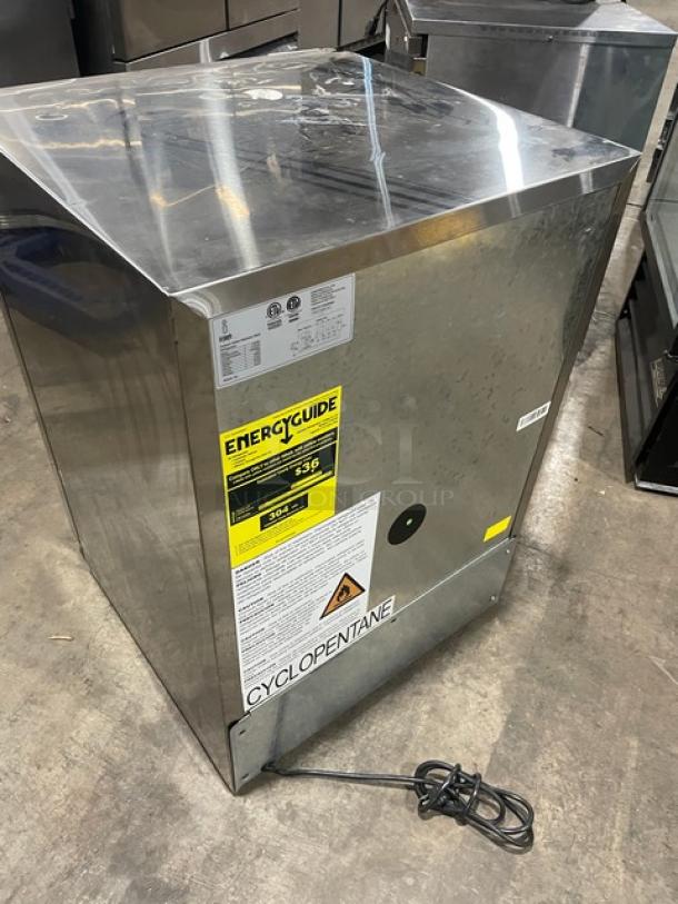 Ice Jungle C150-SD stainless steel outdoor refrigerator, 24" single door, with poly coated wire rack, 115V, EnergyGuide label visible.
