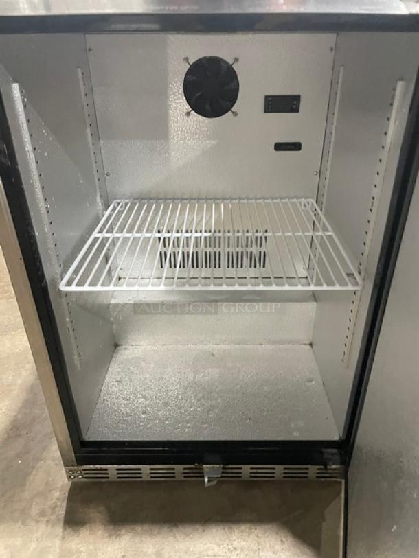 Ice Jungle C150SD refrigerator, stainless steel, single door, with poly-coated wire rack, excellent condition.
