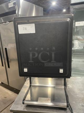 Star HPDE2 condiment warmer dispenser, black powder-coated stainless steel, electric, countertop model, 120V, push buttons, used condition.