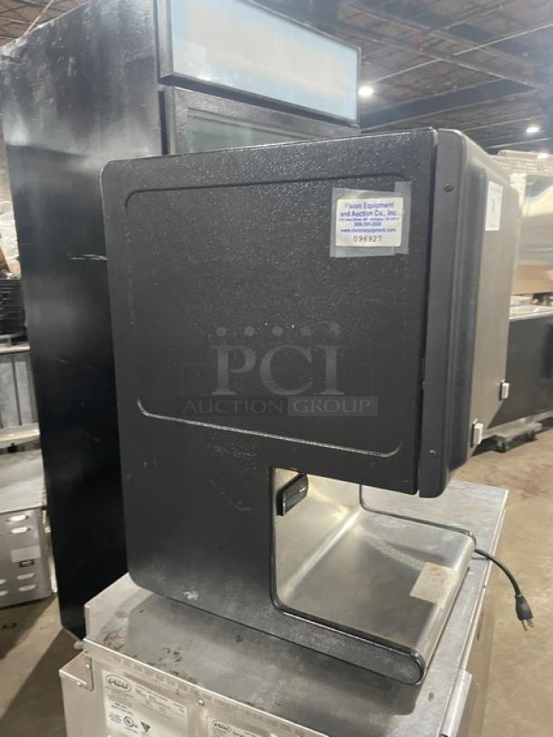 Star HPDE2 black powder coated stainless steel electric condiment warmer dispenser with push button, 120V, good condition.