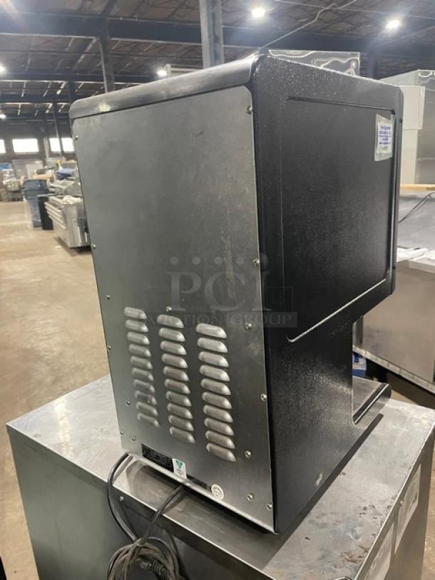 Star HPDE2 electric countertop condiment warmer, black powder-coated stainless steel, push button, 120V, excellent condition.