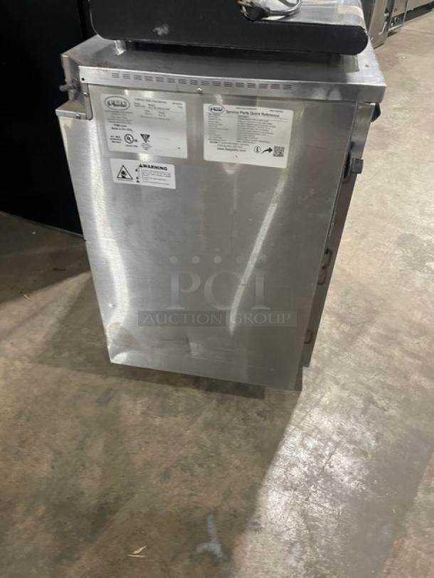 FWE Stainless Steel Electric Holding Cabinet, Model HLC-SL1826-8-CHP, with wired racks, 120V, on casters, tags visible.