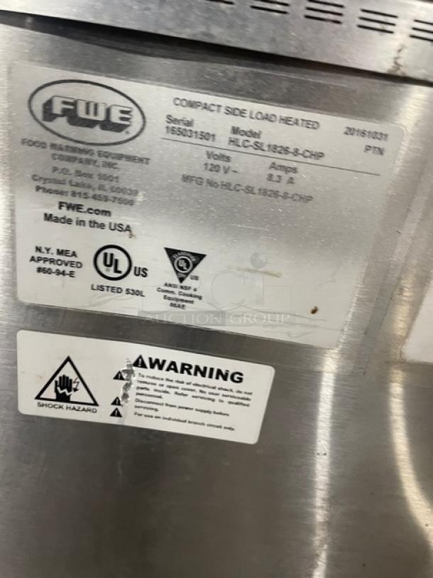 FWE commercial stainless steel warming cabinet, model HLC-SL1826-8-CHP, 120V, with wired racks and safety labels.