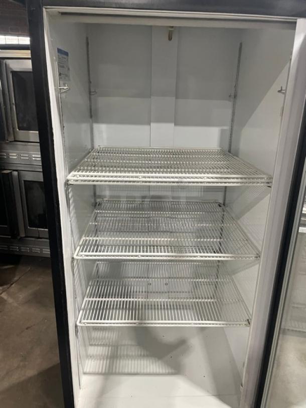 Beverage-Air MT27 commercial black single glass door merchandiser refrigerator with poly coated wire racks, model MT27.