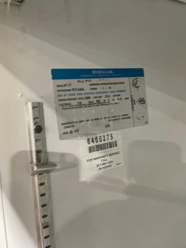 Beverage-Air MT27 merchandiser refrigerator label showing model, SN 6465275, and specifications for 115V 1 Phase.