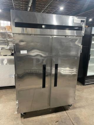 Delfield 6151XL-S stainless steel commercial 2-door reach-in freezer, Energy Star certified, on casters, with wire racks.