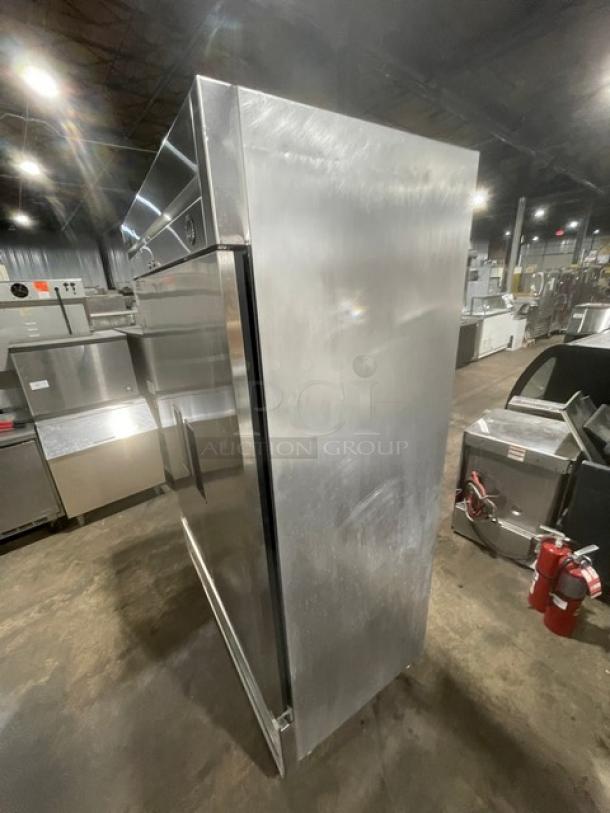 True T49 Commercial Stainless Steel 2 Door Refrigerator, poly-coated wire racks, model T-49, on casters, 115V, good condition.