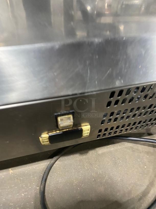 Avantco Commercial Stainless Steel Refrigerated Countertop Prep Rail, vented panel, durable condition.
