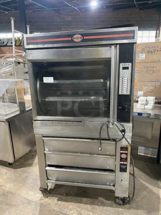 Cleveland Range stainless steel rotisserie convection oven, model BMR-32, with 3-drawer warmer, on casters, natural gas-powered.