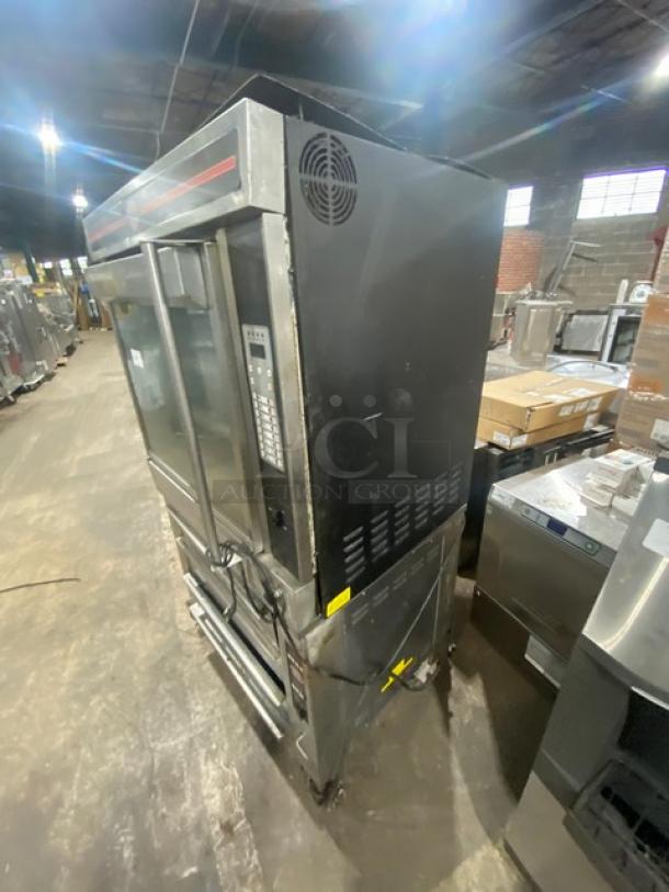 Cleveland Range commercial rotisserie convection oven and warmer, model BMR32/BMW334, stainless steel, on casters, used condition.