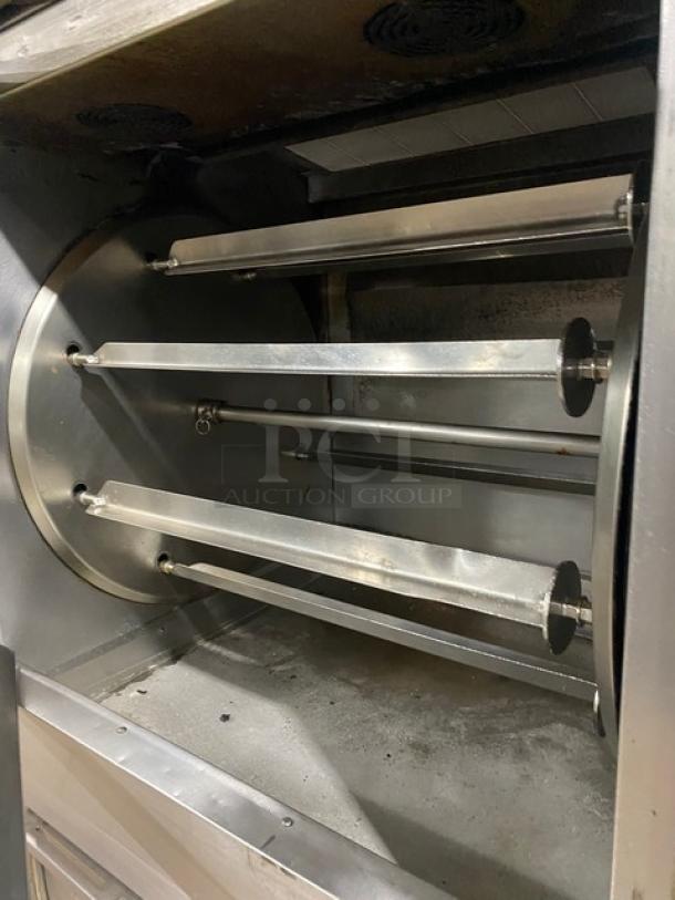 Cleveland Range BMR-32 stainless steel rotisserie convection oven, natural gas powered, with 3 rotisserie rods, on casters.