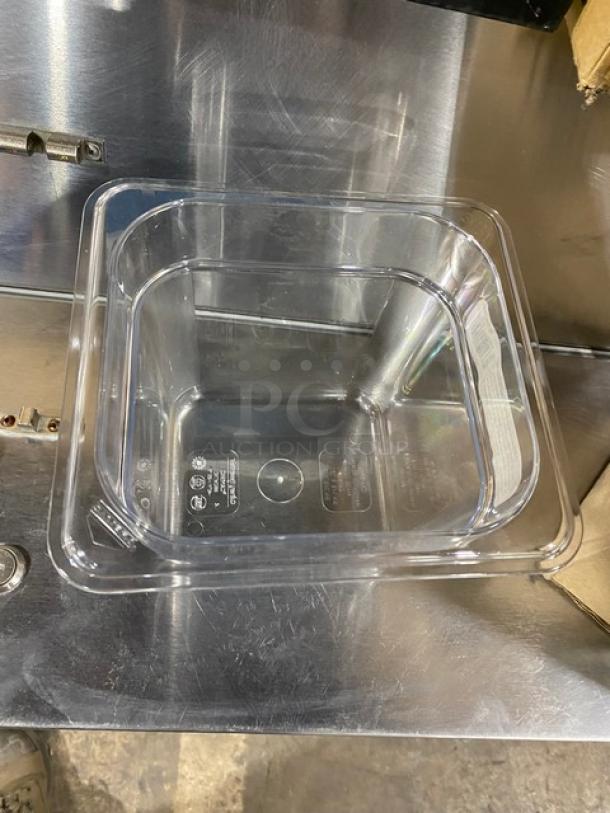 Cambro Camwear 66CWTRI135 clear polycarbonate food pan, 1/6-size, 6" deep, brand new, commercial quality, markings visible.