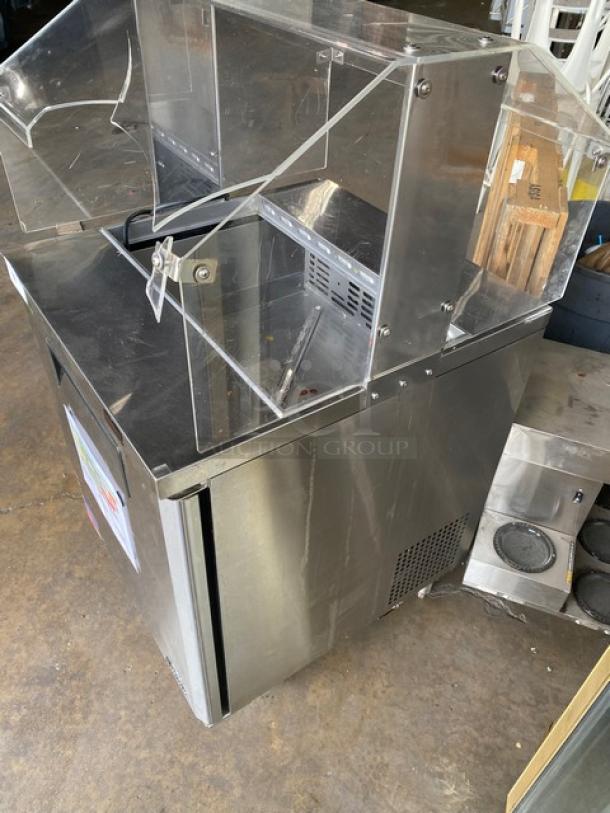 Turbo Air M3 Series single door refrigerated prep table, model MST-28-N-711S, with sneezeguard and poly wire rack.