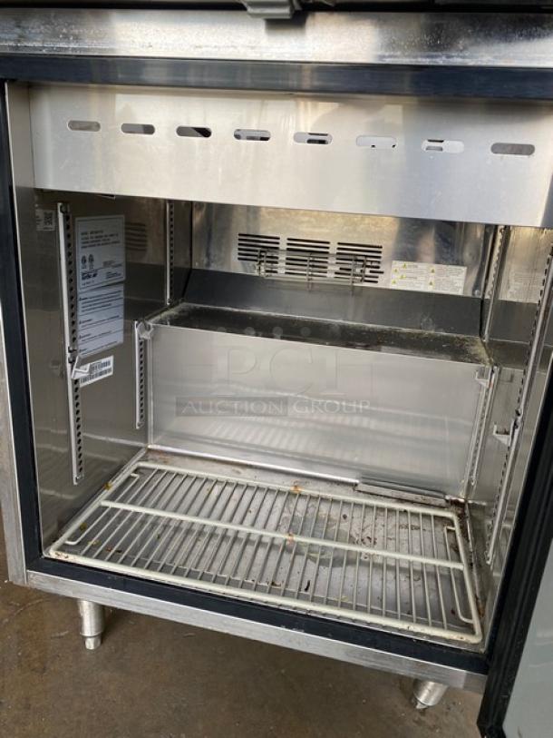 Turbo Air M3 Series single door prep table model MST-28-N-711S, stainless steel, poly coated wire rack, on legs.