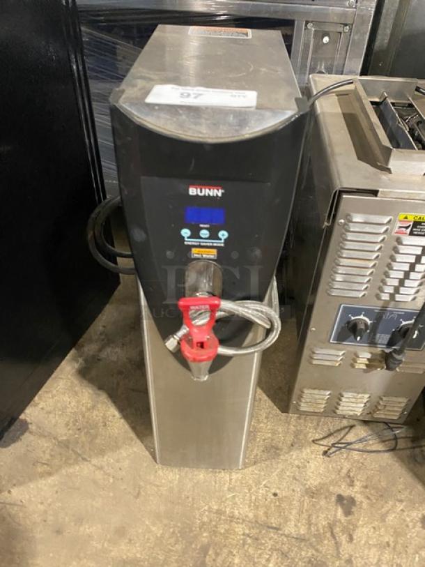 Bunn commercial stainless steel hot water dispenser with digital controls and visible branding. In used condition.