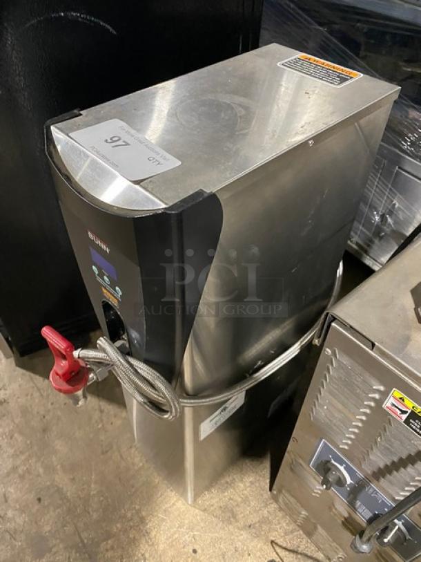 Bunn commercial stainless steel hot water dispenser with digital temperature controls. Features visible brand marking.