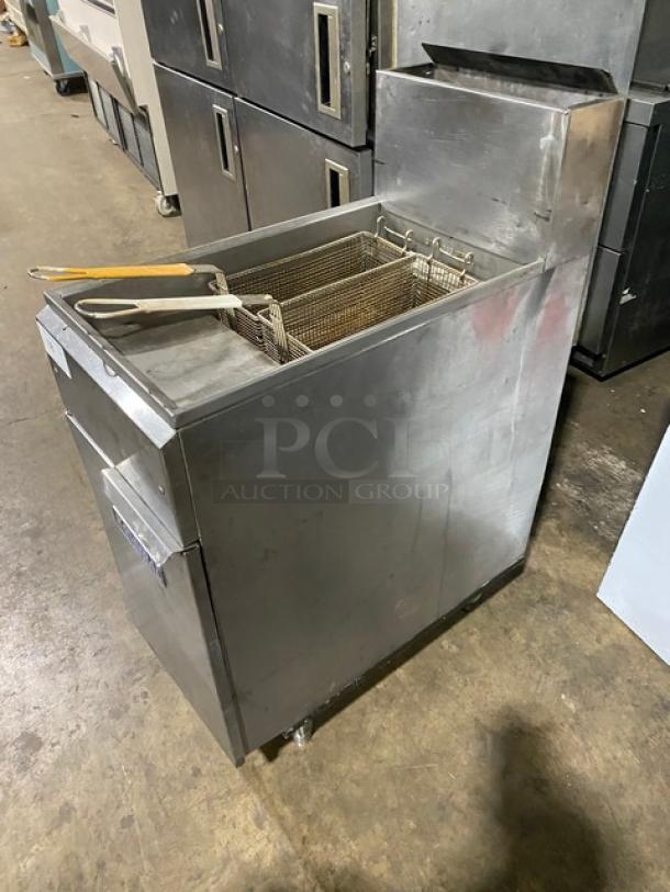 Imperial commercial stainless steel natural gas deep fat fryer with backsplash, fry baskets, on legs. Used condition.