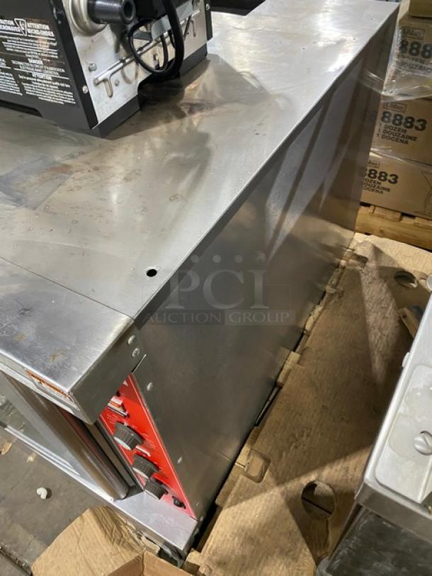 Vulcan commercial stainless steel convection oven, natural gas, single-stacked, thermostatic control, wired racks, good condition.