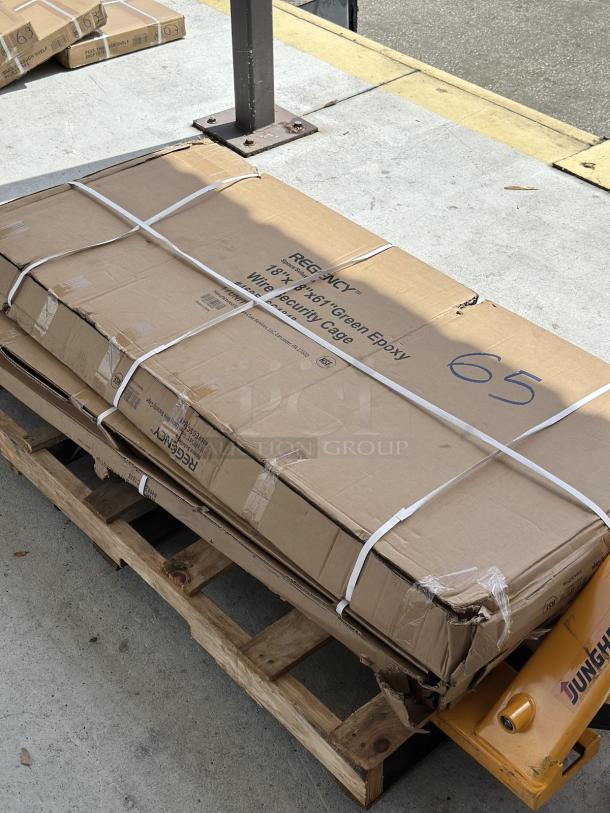 Regency NSF Green Wire Security Cage, model 460EGSC1848, packaged in a cardboard box on a wooden pallet. Box shows slight wear.