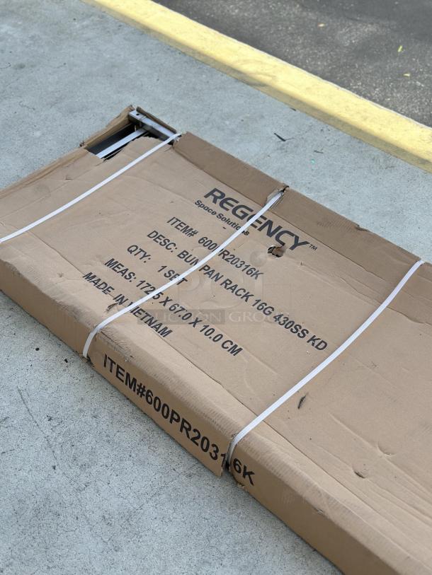 Brand new Regency 20 Pan End Load Stainless Steel Bun/Sheet Pan Rack, model 600pr20316k, unassembled in box.