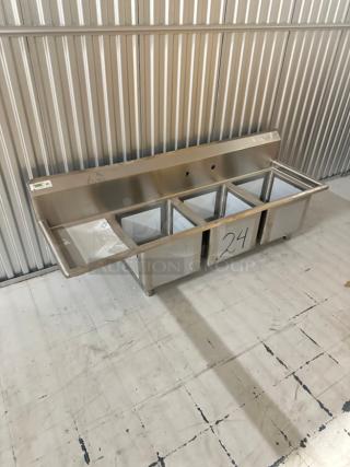 Regency 66.5" stainless steel sink, model 60S3151515GL, 3 compartments, left drainboard, new condition, slight dents.