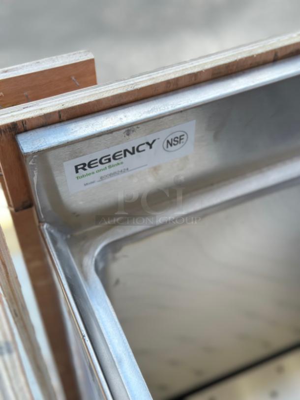 Regency stainless steel beer box, model 600BB2424, 24"x24", 3" backsplash, scratch and dent, NSF label visible.