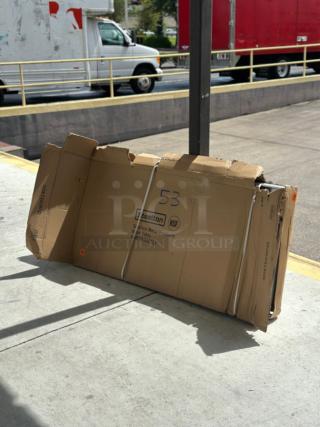 Boxed Steelton 30" x 72" 18 Gauge 430 Stainless Steel Work Table, Model 522ETSG30722, with visible packaging damage.