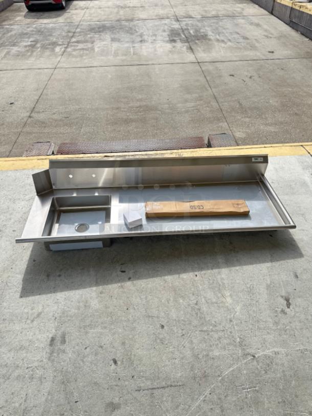 Brand new Regency 16 Gauge 7' Soiled Dish Table, model 600DDTS384RT, with right drainboard, minor scratches visible.