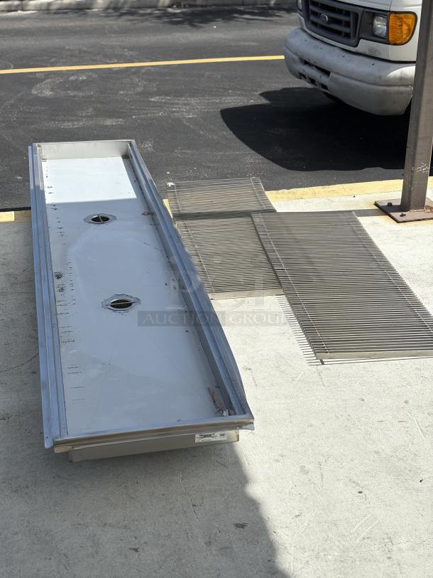 Regency 24"x120" floor trough with grate, 14-gauge stainless steel, model 600FT24120SS, brand new with minor scratches.