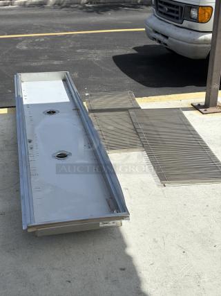 Regency 24"x120" floor trough with grate, 14-gauge stainless steel, model 600FT24120SS, brand new with minor scratches.